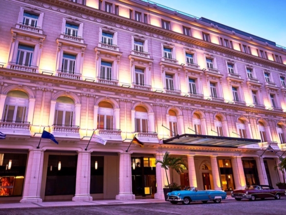 Gran Hotel Manzana Kempinski facade at dusk, Old Havana