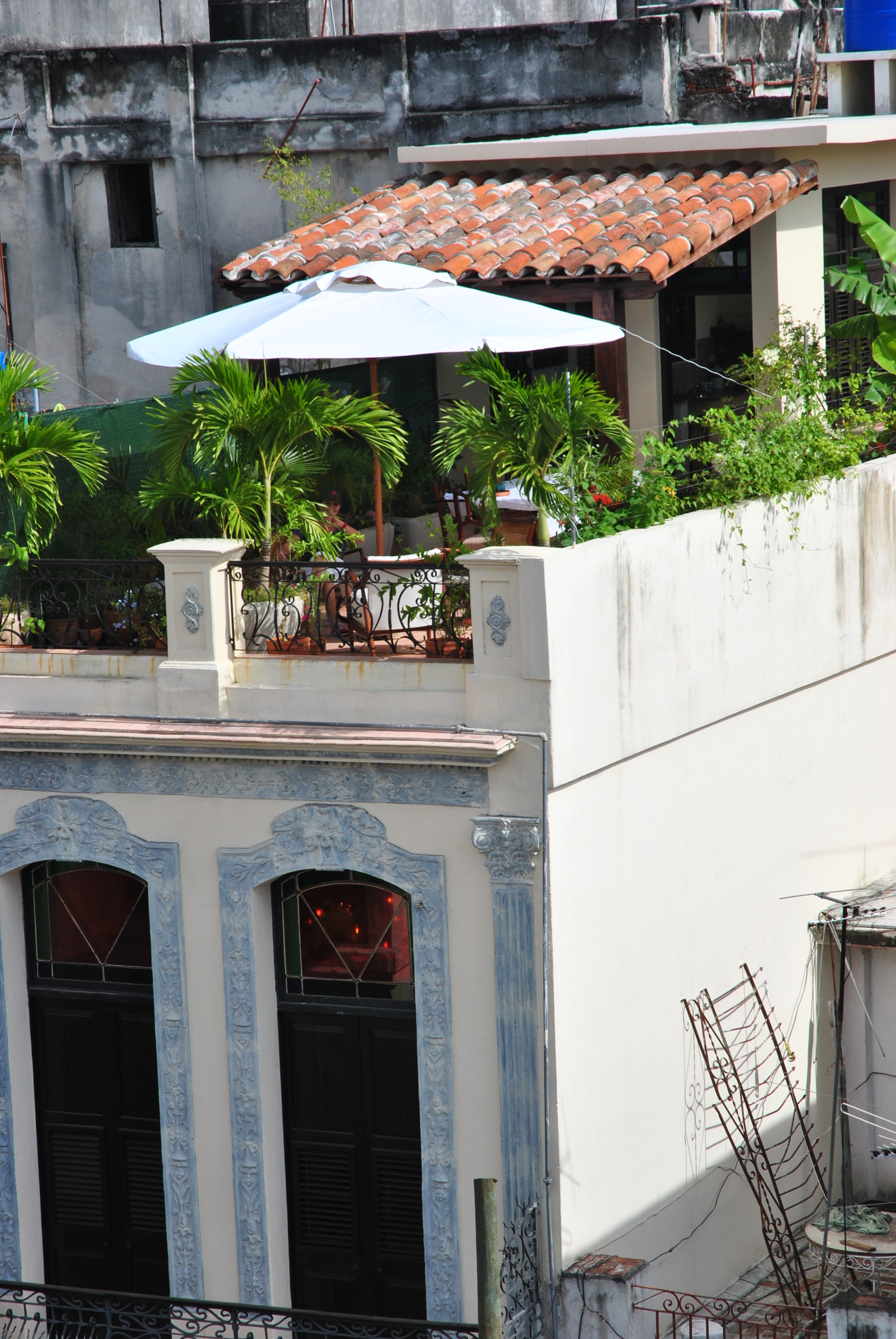 Interior patio and arcade of a restored colonial house in Old Havana, Cuba