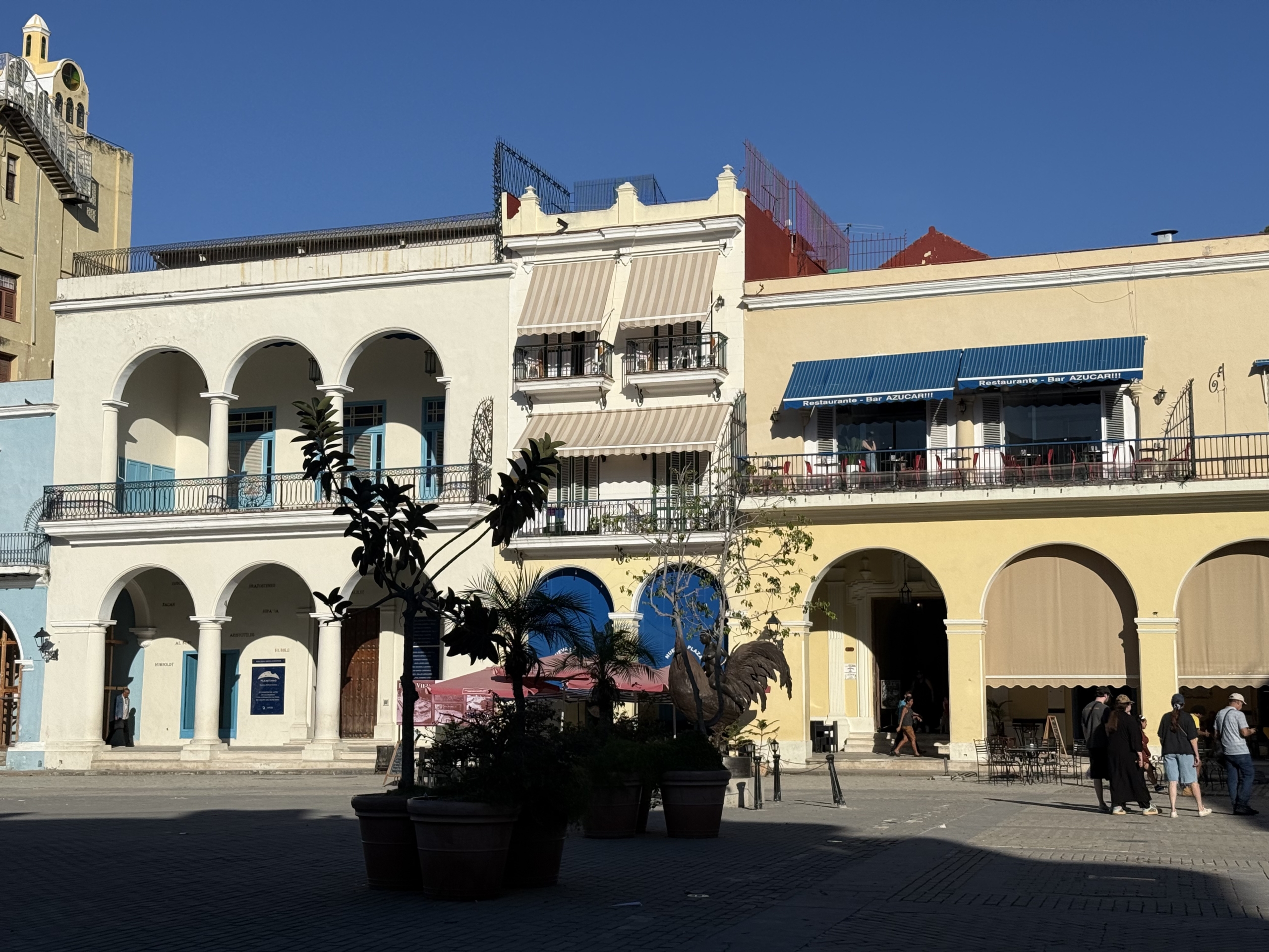 Colonial arcades on Plaza Vieja, Habana Vieja — Havana addresses like these are traded by permuta in Cuba as well as by sale