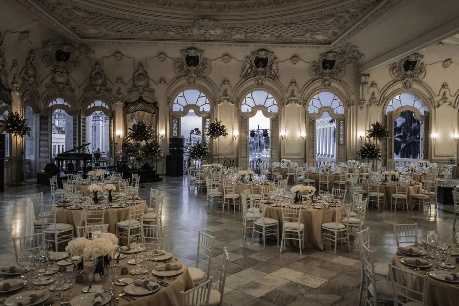 Evening reception under the arcades of a historic plaza in Old Havana, Cuba