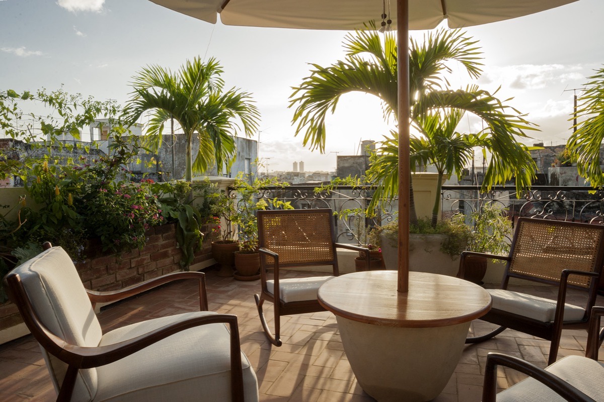 Colonial courtyard of a private house in Old Havana, used as a wedding celebration setting for Legal marriage in Cuba