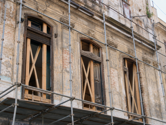 Restoring a colonial building in Old Havana: scaffolding on a protected facade in Habana Vieja