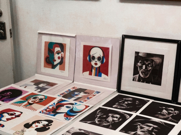 Canvases stacked against the wall of a painter's studio in Havana, where buying art in Cuba usually starts