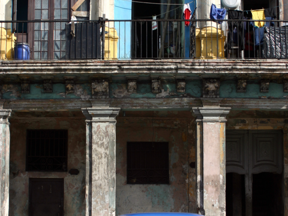 Shaded front porch of a licensed short-term rental in Cuba, Vedado, Havana